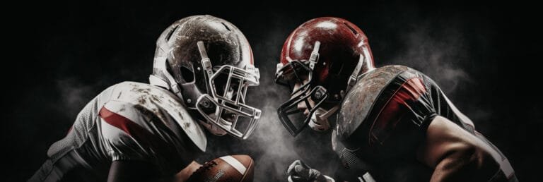 Two college football players facing off at the line of scrimmage before an SEC rivalry game